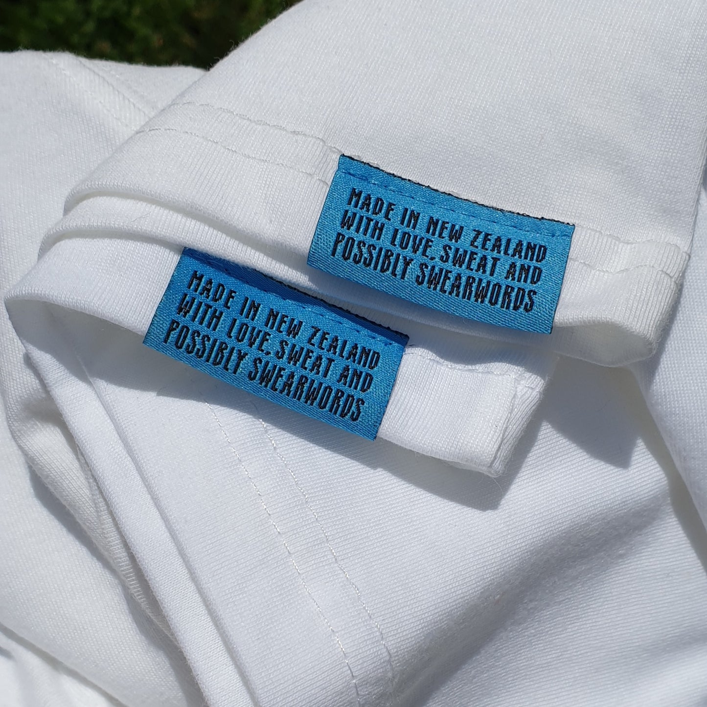 MADE IN NEW ZEALAND WITH LOVE. SWEAT AND POSSIBLY SWEARWORDS - WOVEN LABELS