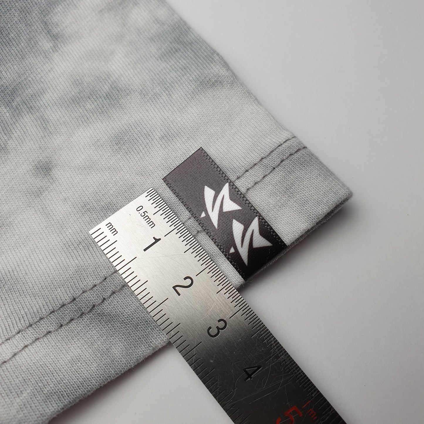 #09WS - HOT CUT SATIN HEM LABELS