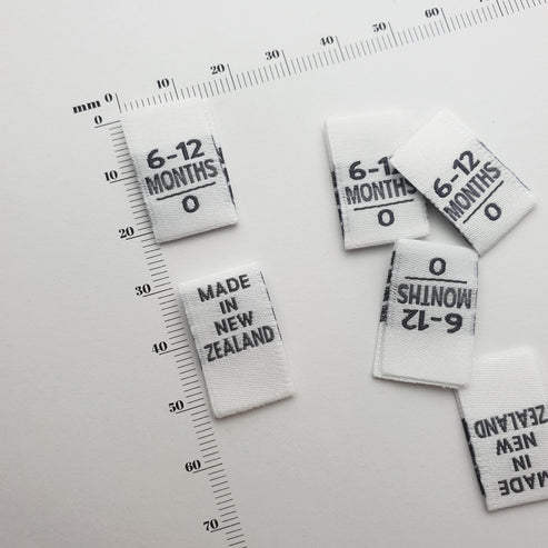 Warm white with charcoal grey numbers / 0, 6-12 MONTHS / MADE IN NEW ZEALAND